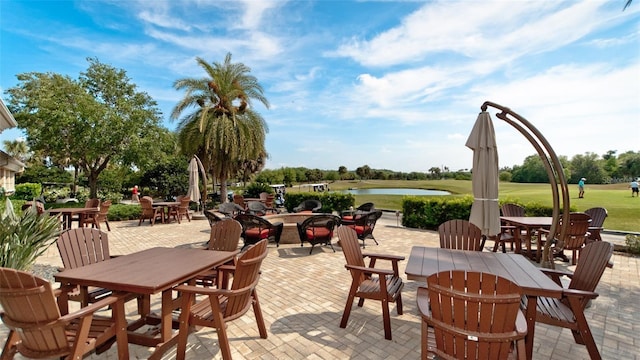 view of patio / terrace featuring a water view