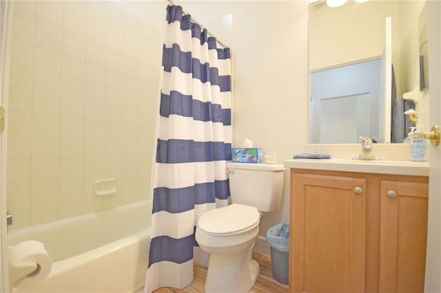 full bathroom with hardwood / wood-style floors, vanity, toilet, and shower / bathtub combination with curtain