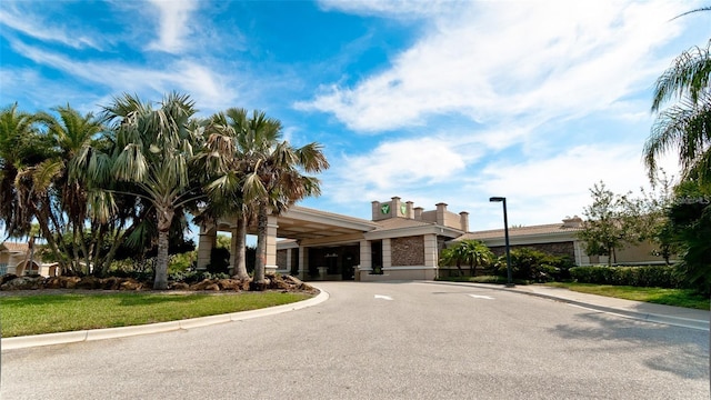 view of front of property featuring a carport