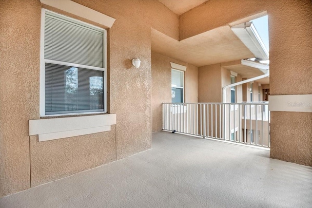 view of patio with a balcony