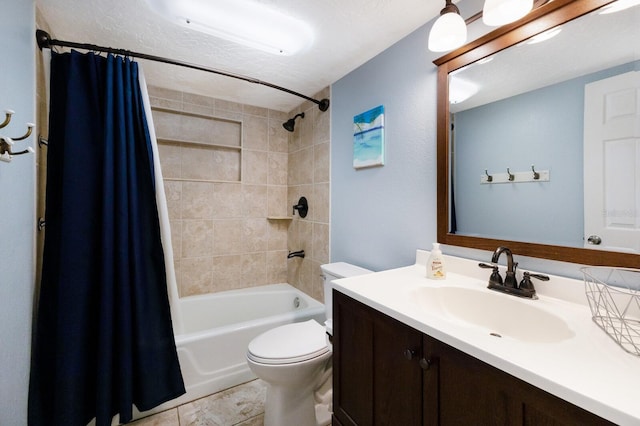 full bathroom featuring tile patterned floors, a textured ceiling, toilet, shower / bath combo with shower curtain, and vanity