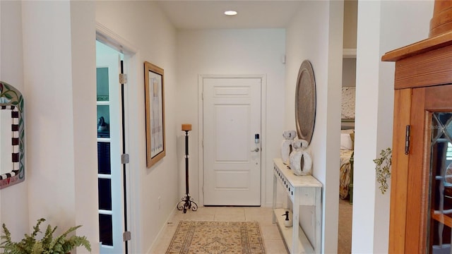 interior space featuring light tile floors