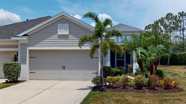 view of front of property featuring a garage