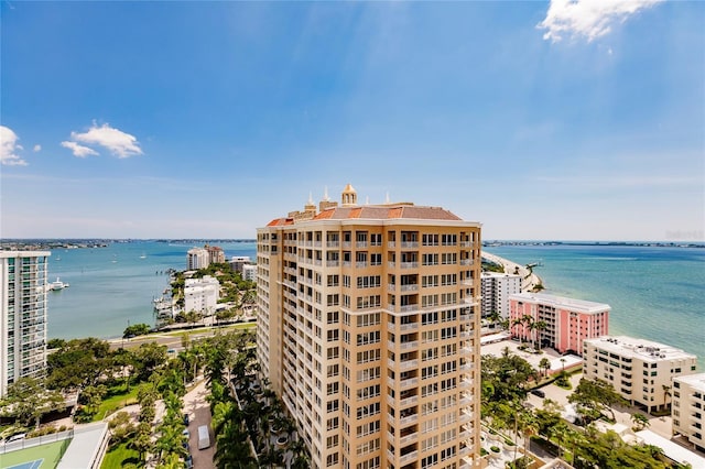 birds eye view of property featuring a water view