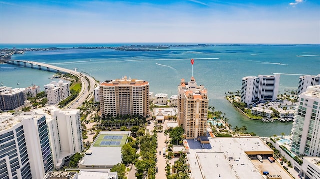 birds eye view of property with a water view