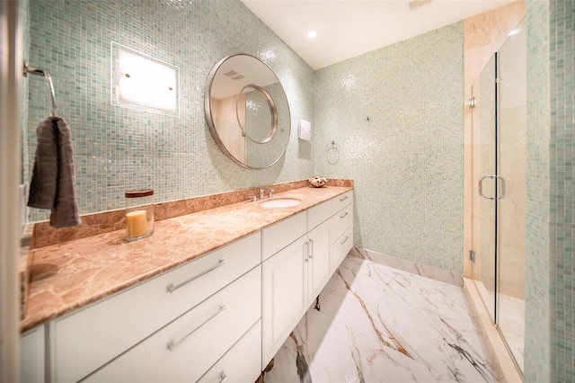 bathroom with vanity and walk in shower