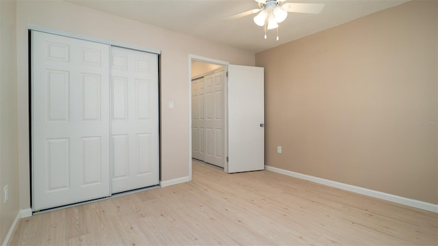 unfurnished bedroom with light wood-type flooring and ceiling fan