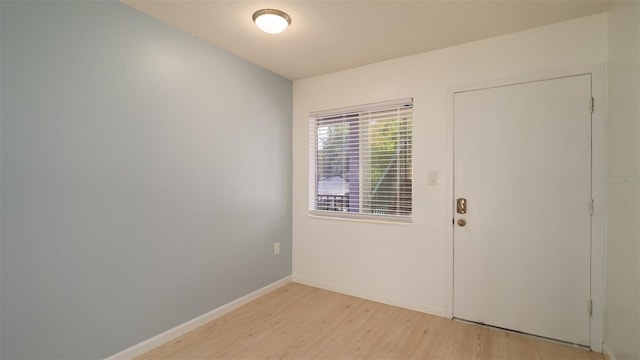 spare room featuring light hardwood / wood-style floors