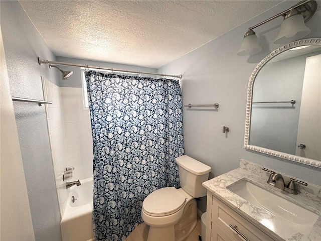 bathroom featuring toilet, shower / bath combo, a textured ceiling, and vanity