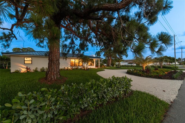 view of front of home with a front yard