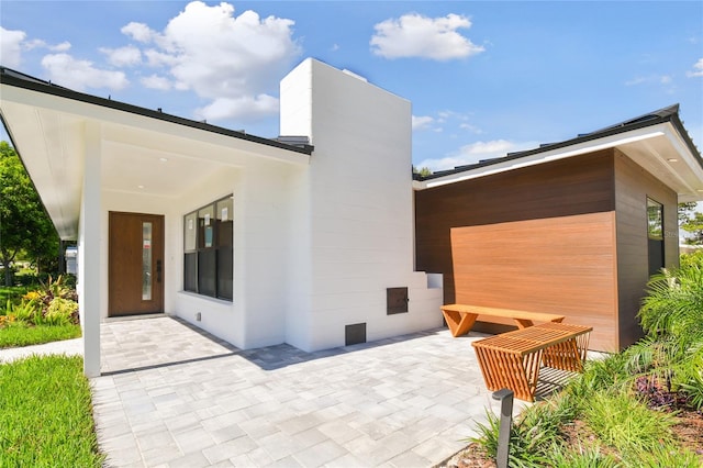 rear view of property with a patio area