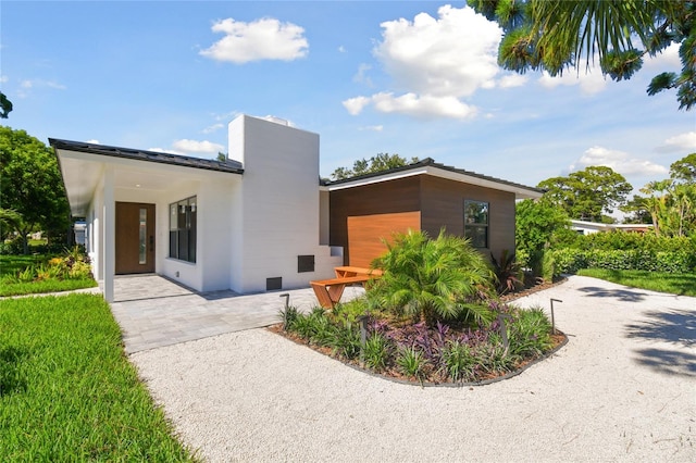 view of front of home with a patio