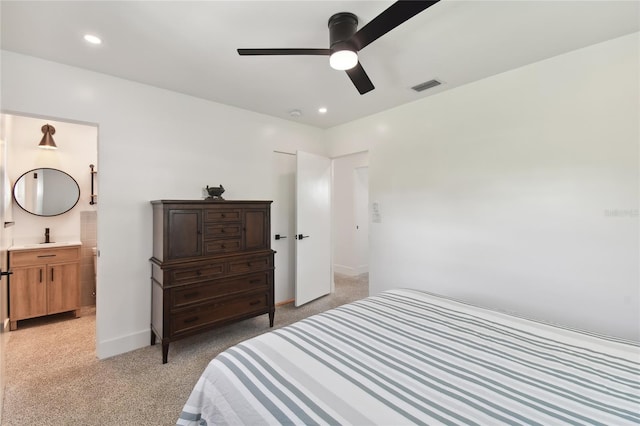 bedroom with light colored carpet and ceiling fan