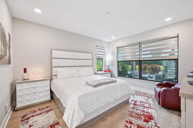 bedroom with light wood-type flooring