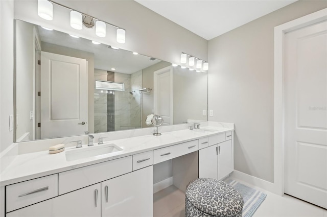 bathroom with tile patterned floors, an enclosed shower, and vanity