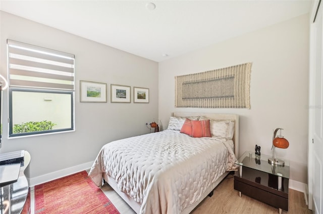 bedroom featuring wood-type flooring