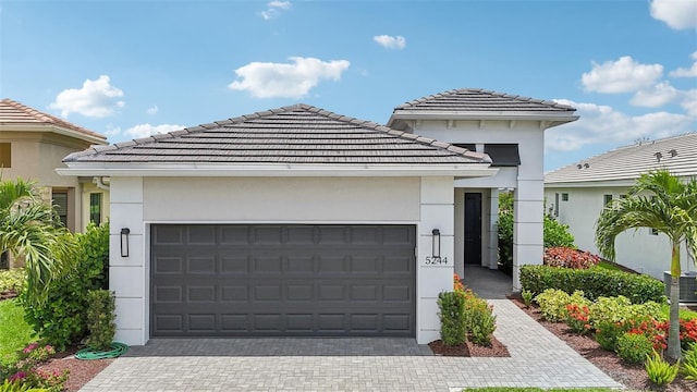 view of front of property featuring a garage