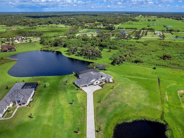 drone / aerial view with a rural view and a water view