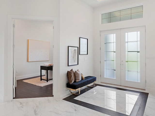 entryway featuring french doors