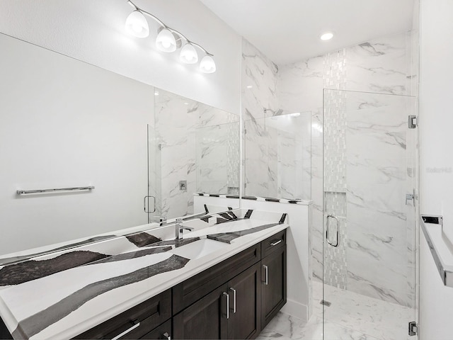 bathroom featuring vanity and an enclosed shower