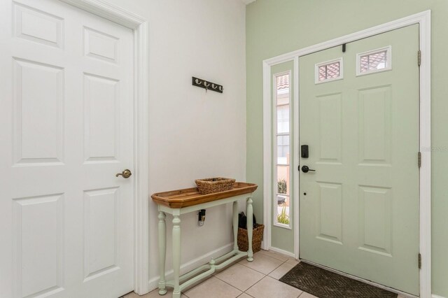 view of tiled foyer entrance