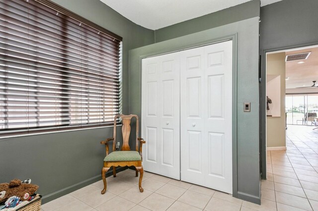 living area with light tile patterned floors