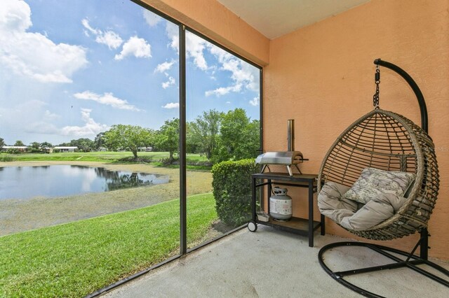 sunroom with a water view