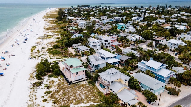 aerial view with a view of the beach and a water view