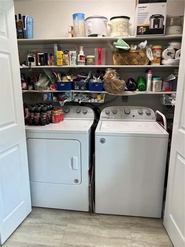 laundry room with washer and clothes dryer