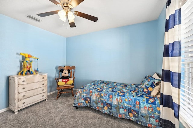 carpeted bedroom with ceiling fan