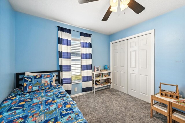 bedroom featuring carpet floors, a closet, and ceiling fan