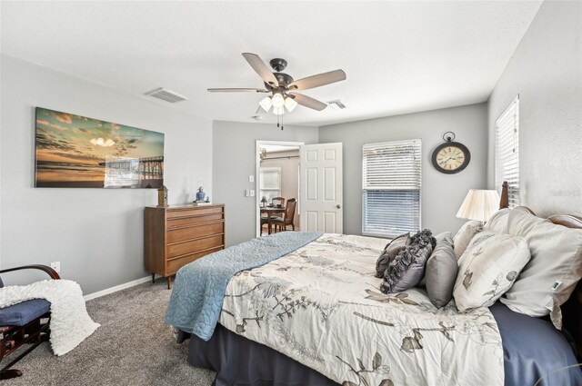 carpeted bedroom featuring ceiling fan