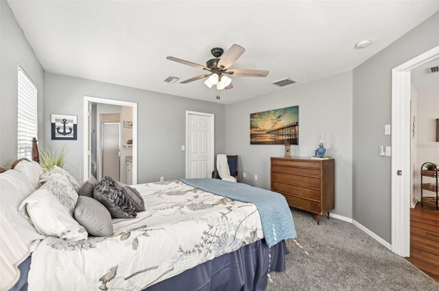 carpeted bedroom featuring ceiling fan and connected bathroom