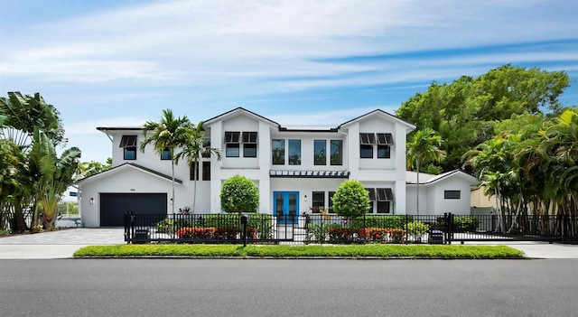 view of front of property featuring a garage