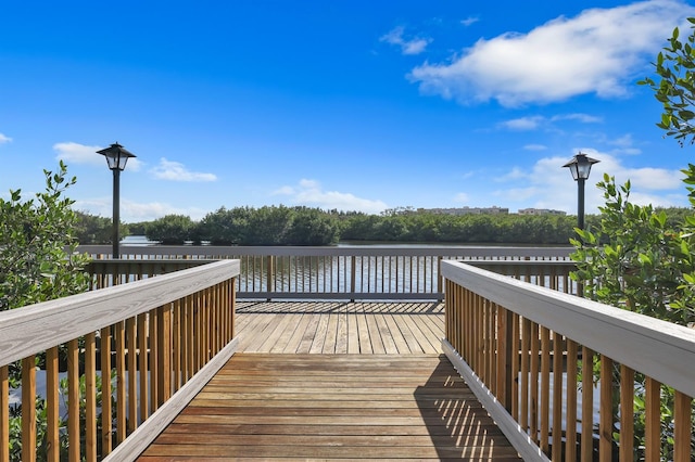 deck featuring a water view