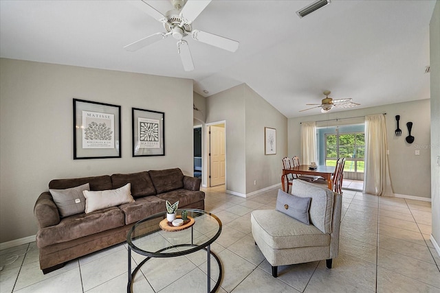 tiled living room featuring ceiling fan and lofted ceiling