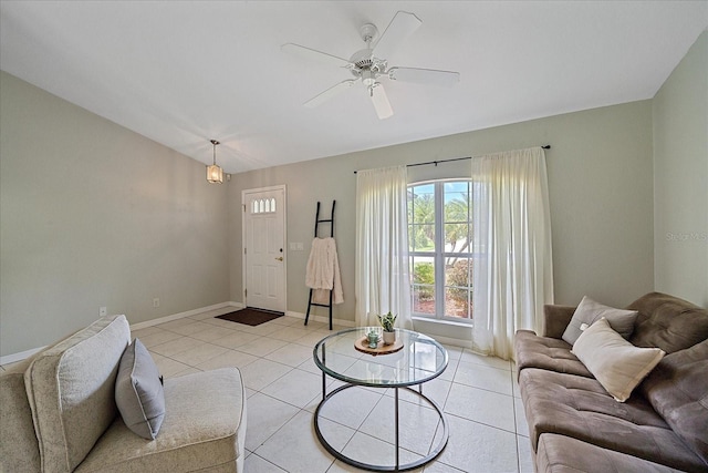 tiled living room featuring ceiling fan