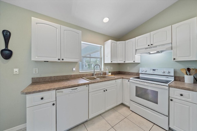 kitchen with sink, white cabinets, and white appliances