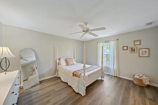 bedroom featuring dark wood-type flooring and ceiling fan