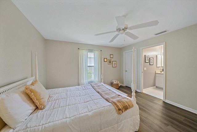 bedroom with ceiling fan, wood-type flooring, and ensuite bathroom