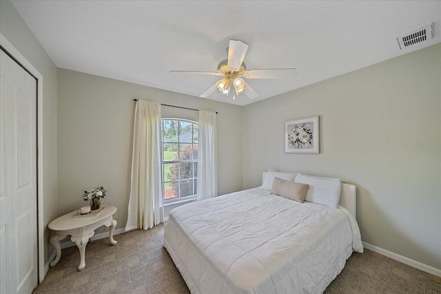 carpeted bedroom featuring ceiling fan