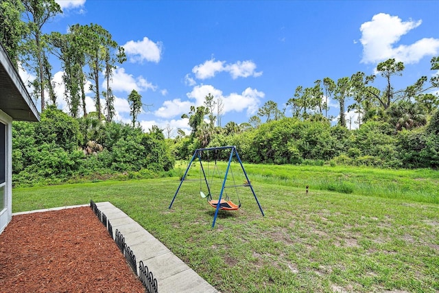 view of yard featuring a playground