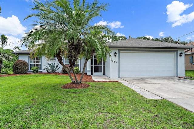 ranch-style home with a garage and a front lawn