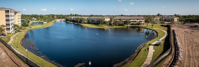 drone / aerial view with a water view