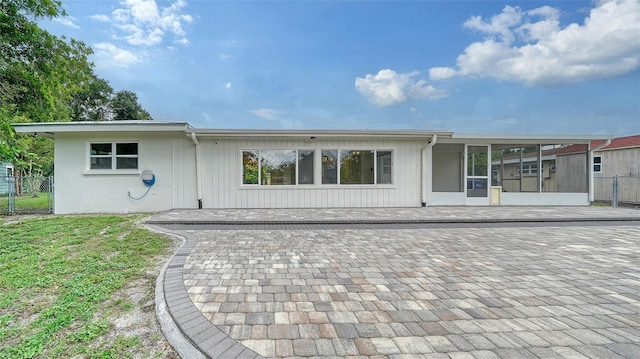 rear view of house with a patio area