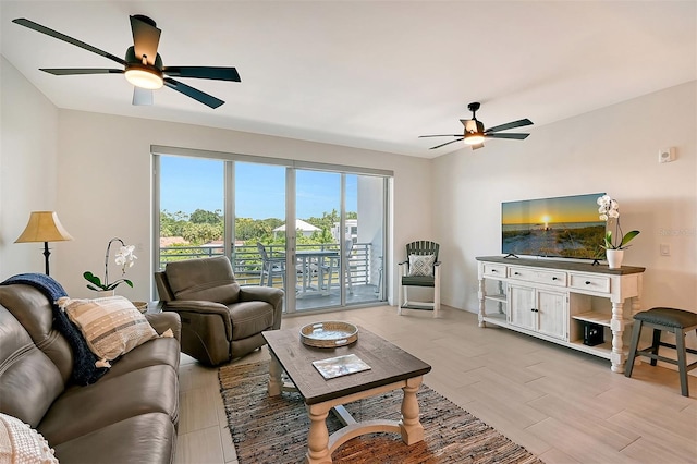 living room featuring ceiling fan