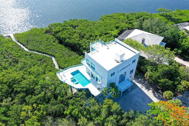 birds eye view of property featuring a water view