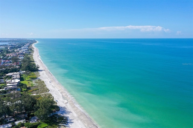 drone / aerial view with a view of the beach and a water view