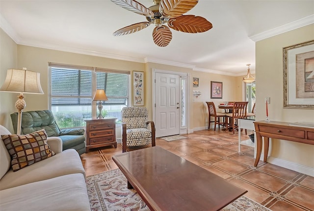 living room with ceiling fan, tile patterned flooring, and crown molding