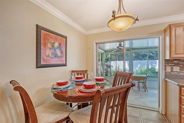 dining room featuring ornamental molding